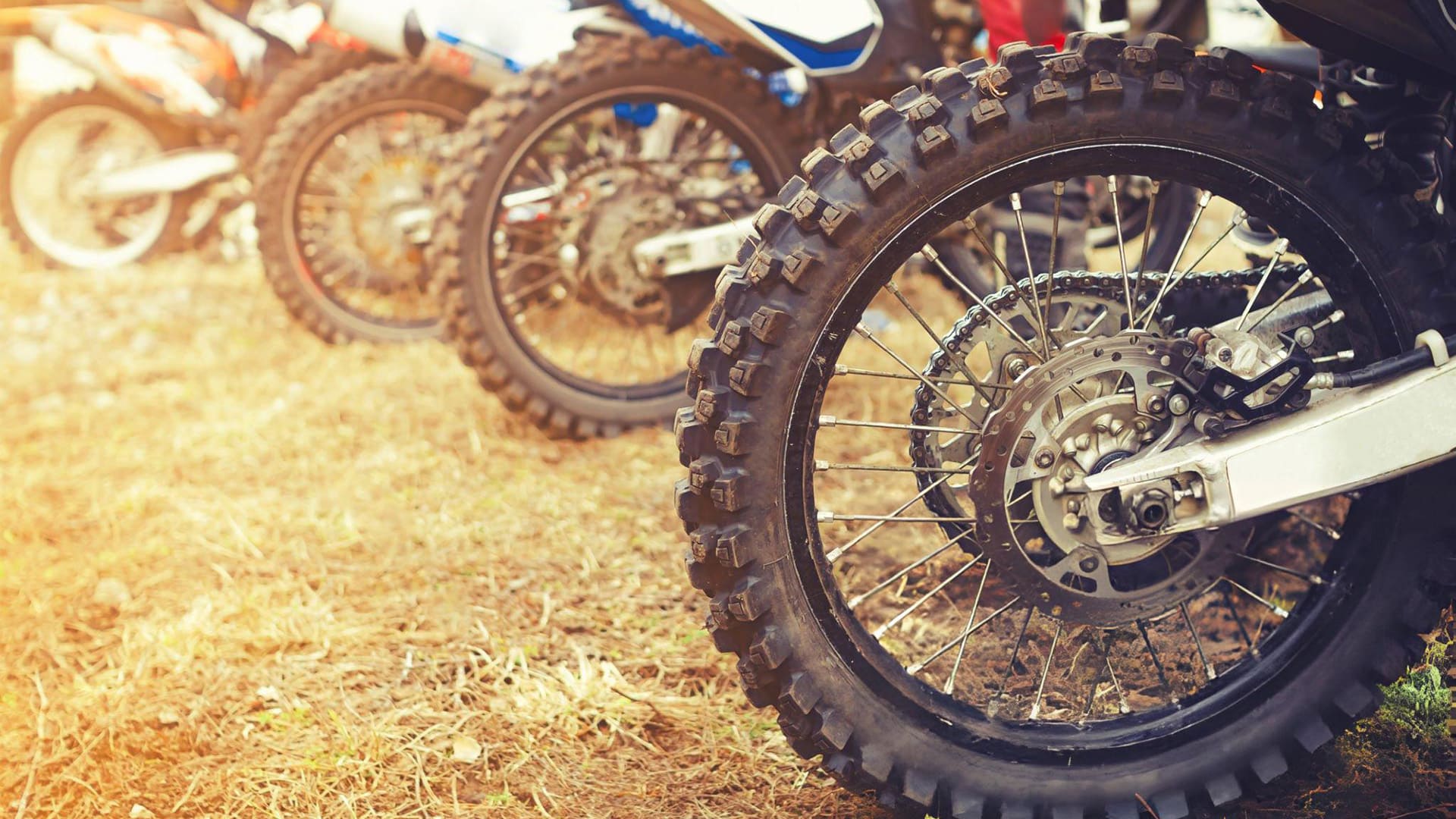 the close-up of tyres of dirt bike